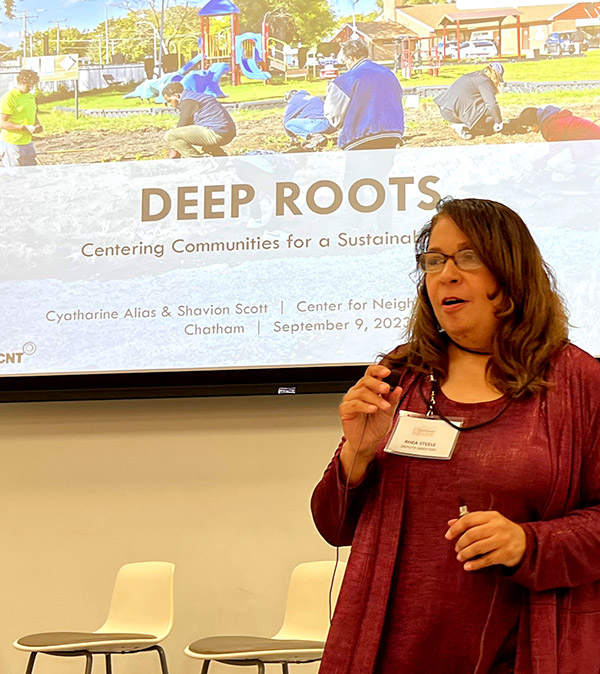 A Greater Chatham Initiative leader introduced staff member Cyatharine Alias at a fall event to address urban flooding at a September community meeting.