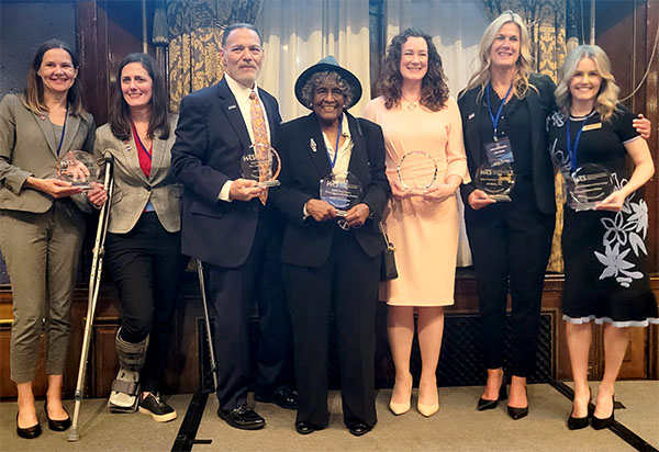 Jacky Grimshaw recieving an award at the Urban League’s Equity in Clean Energy and Water Summit and WTS