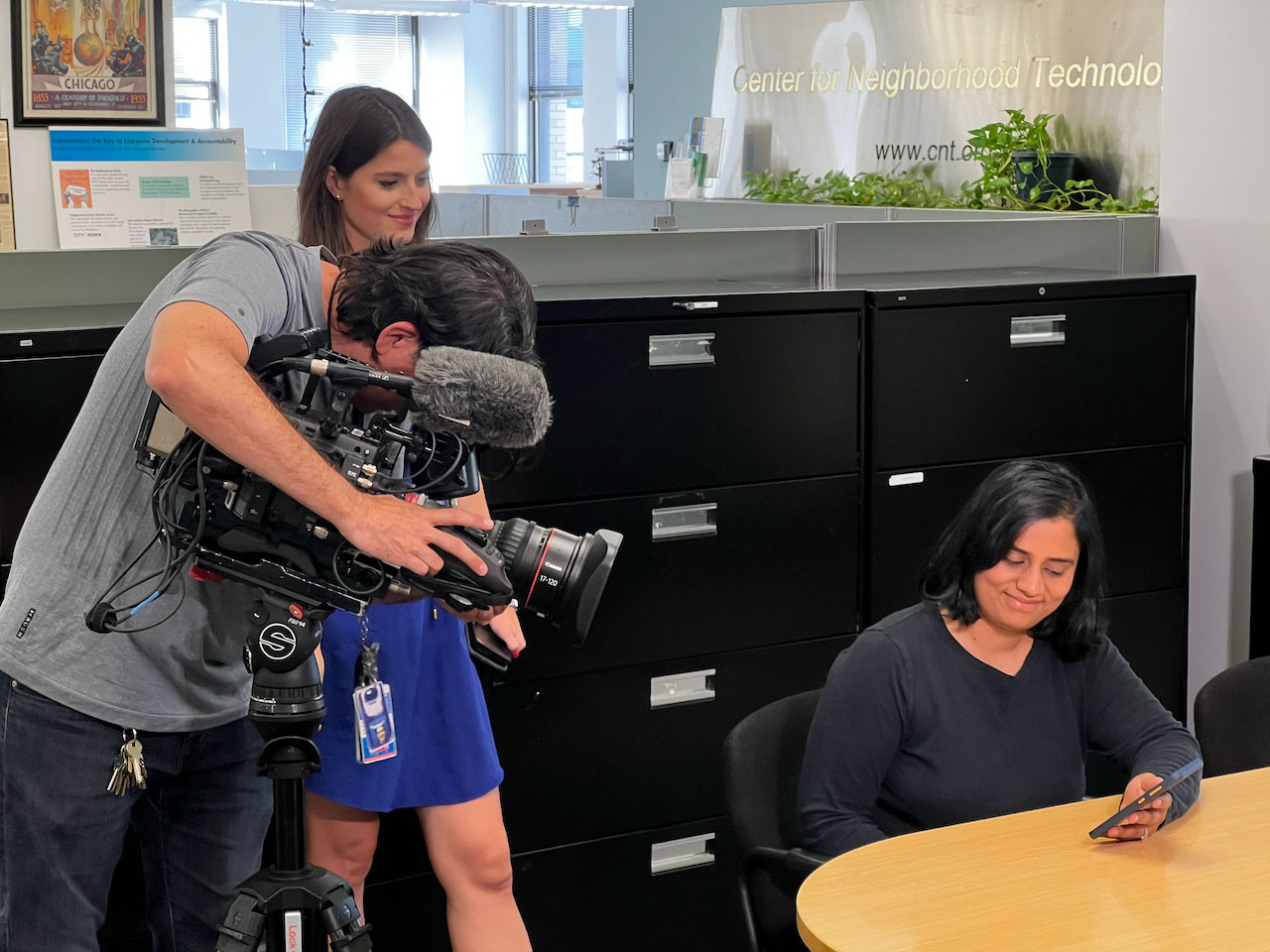 Preeti Shankar demonstrates CNT's Urban Flooding Baseline tool during an NBC-TV interview.