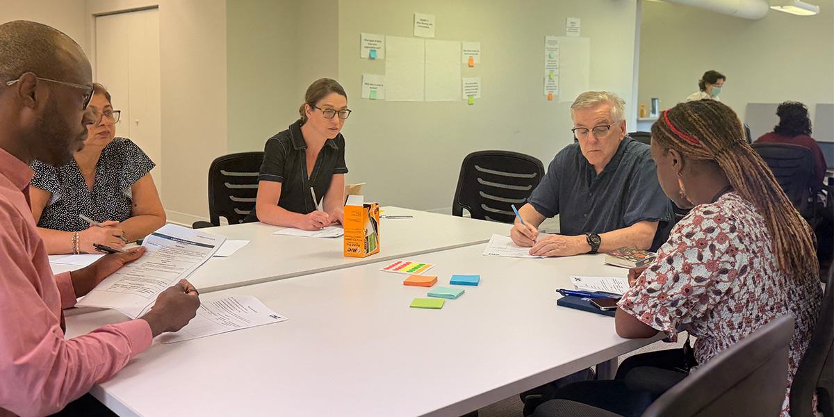 Community members from partnering community-based organizations convene to discuss challenges related to data governance. 