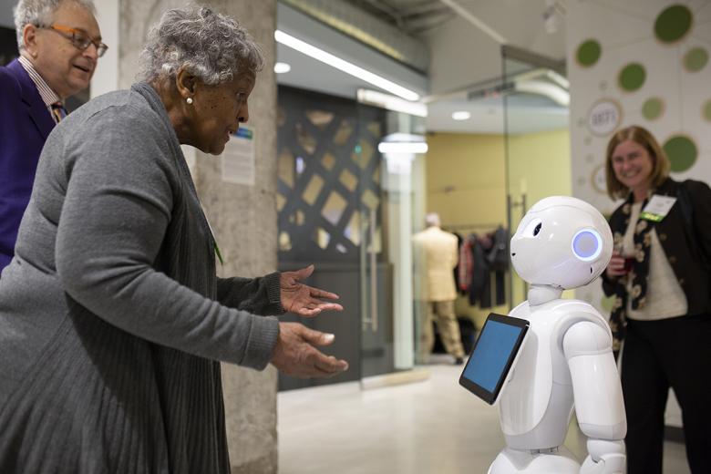 CNT's Jacky Grimshaw chatting with Pepper the robot