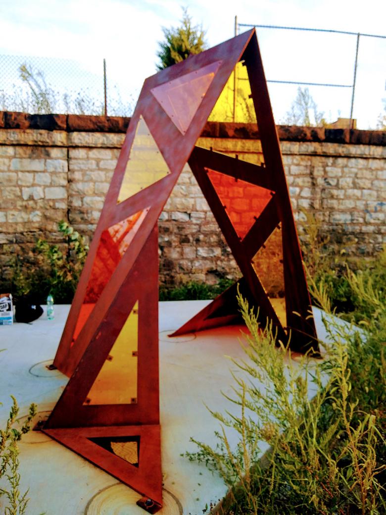 The completed shade sculpture! The multi-colored panels are a nod to the similarly multi-colored plexiglass used at the Kedzie Lake Green Line Station.