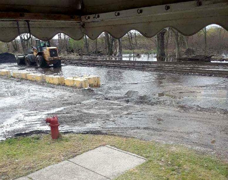 Severe flooding occurred on both sides of railroad tracks that run through the neighborhood. Residents reported that the railroad company moved concrete barriers away from the tracks, to make the tracks safe, and this allowed the runoff to flow towards homes along the railroad line.</br></br>Photo by Janetta Little 10th Ward Resident